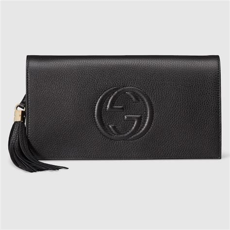 soho gucci clutch|Gucci embossed clutch.